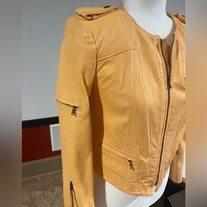 Alice Olivia leather jacket buttery soft beautiful vivid cantaloupe color. XS.